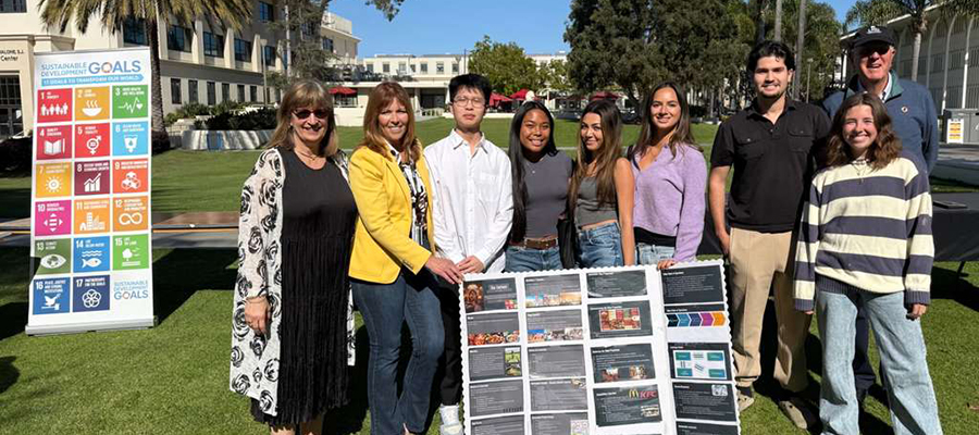 Dean Smith and Jeff Thies with students at a poster session